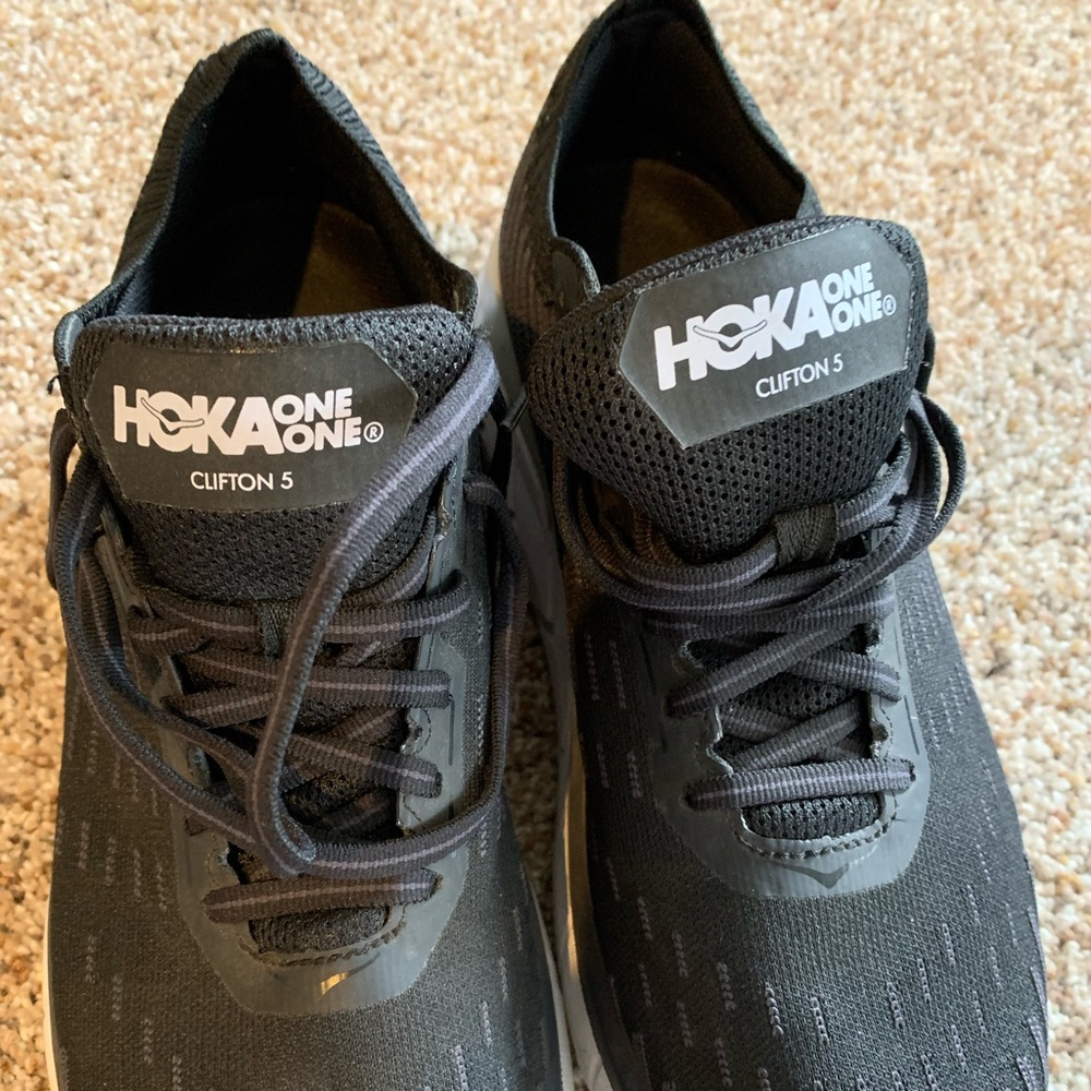 Women’s black Hoka Clifton running shoes